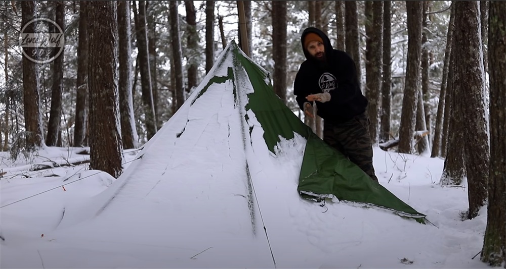 outdoor camping in a firehiking hot tent